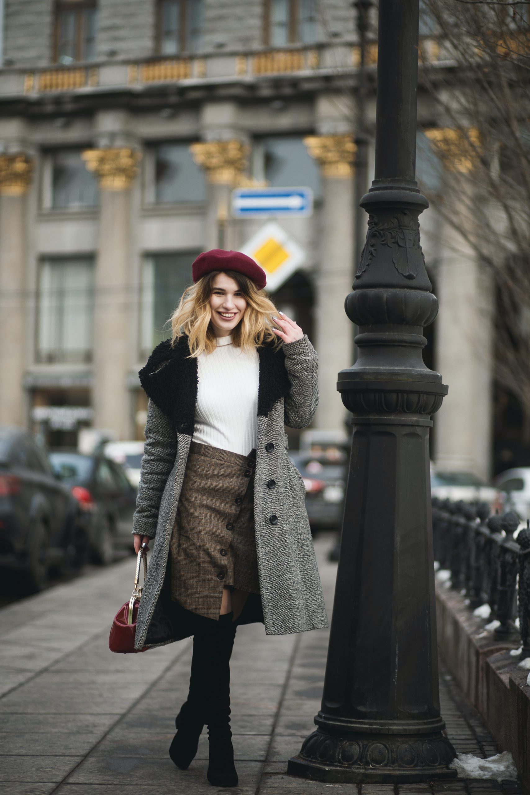 woman-standing-near-post-1381556